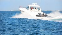 SEK BOAT GOING AWAY WAVES.jpg